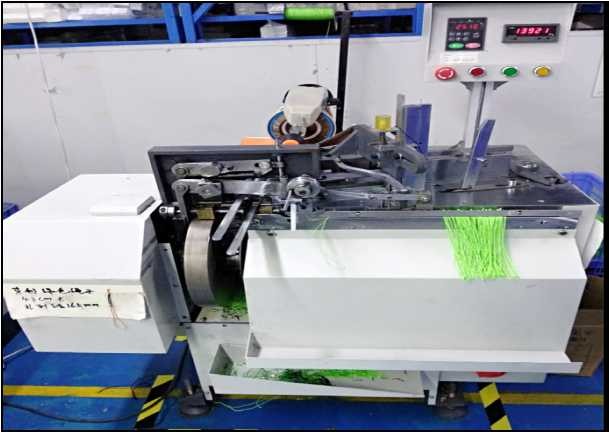 Automatic rope tying machine